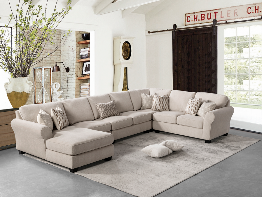 A chaise sectional sofa offers comfortable lounging and versatile seating arrangements. But when it comes to selecting an area rug, the chaise longue portion can complicate standard sizing.