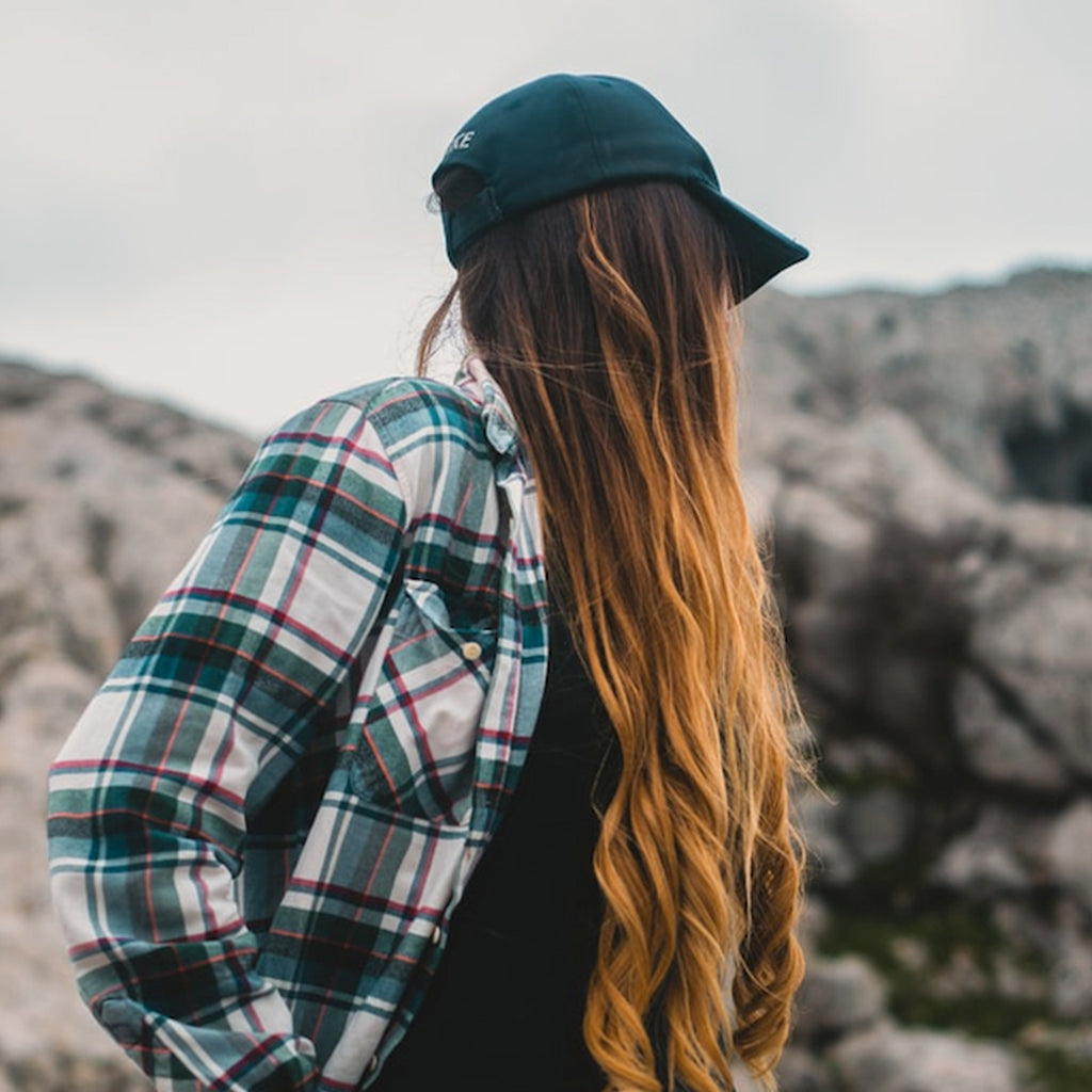 how to wear a baseball cap with long hair