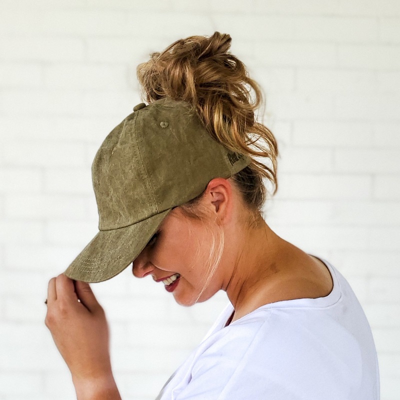 low bun with baseball cap