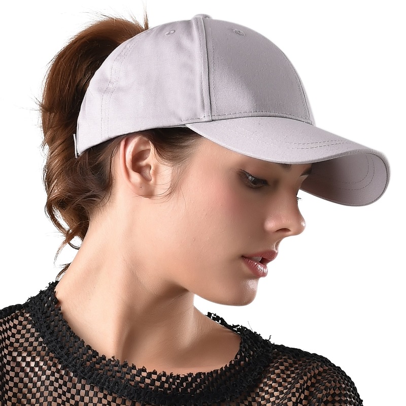 low bun with baseball cap