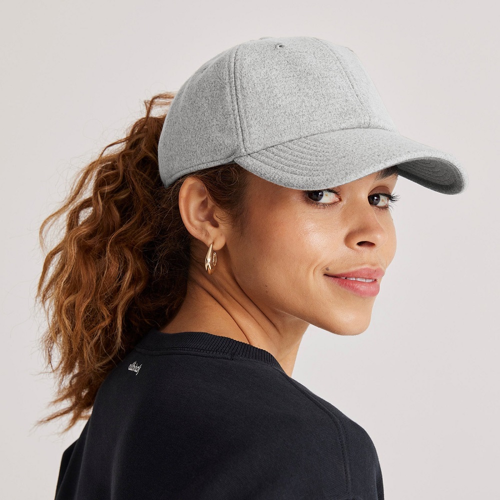 woman wearing baseball cap