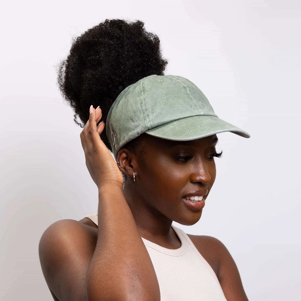 short curly hair with baseball cap