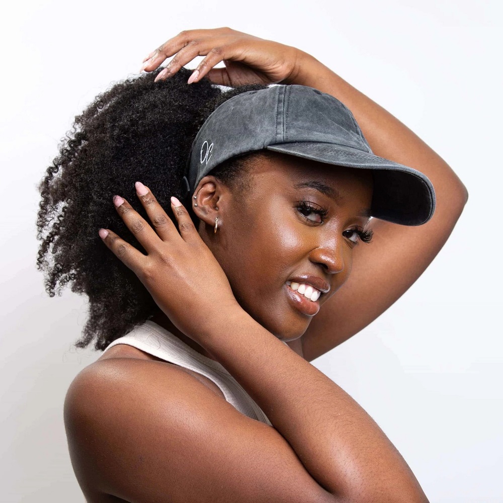short curly hair with baseball cap